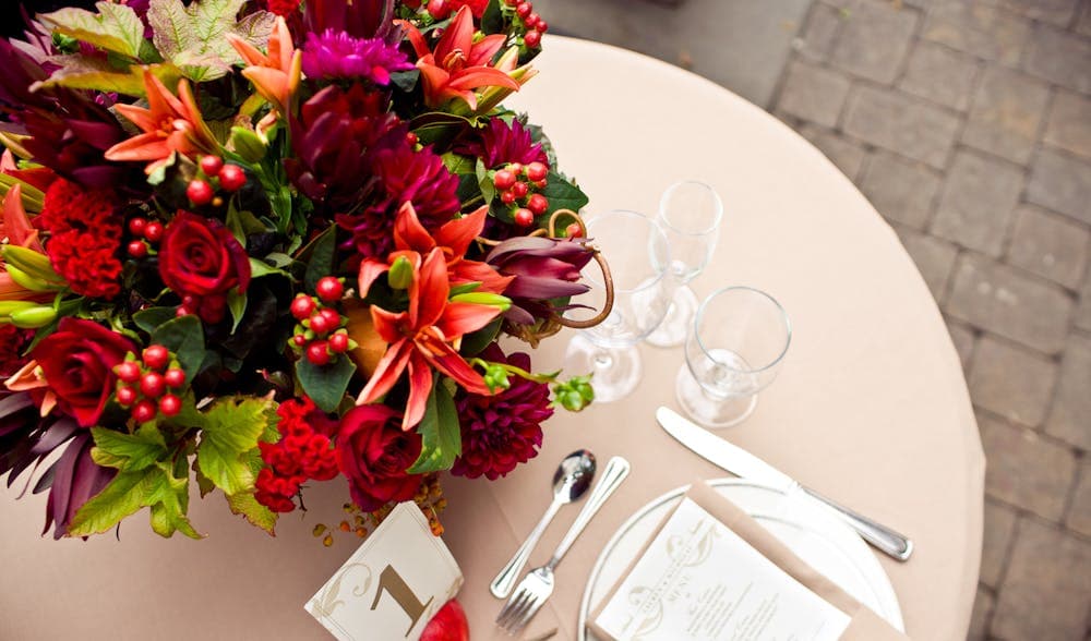 Table Setting with Glasses, Flowers, and Flatware